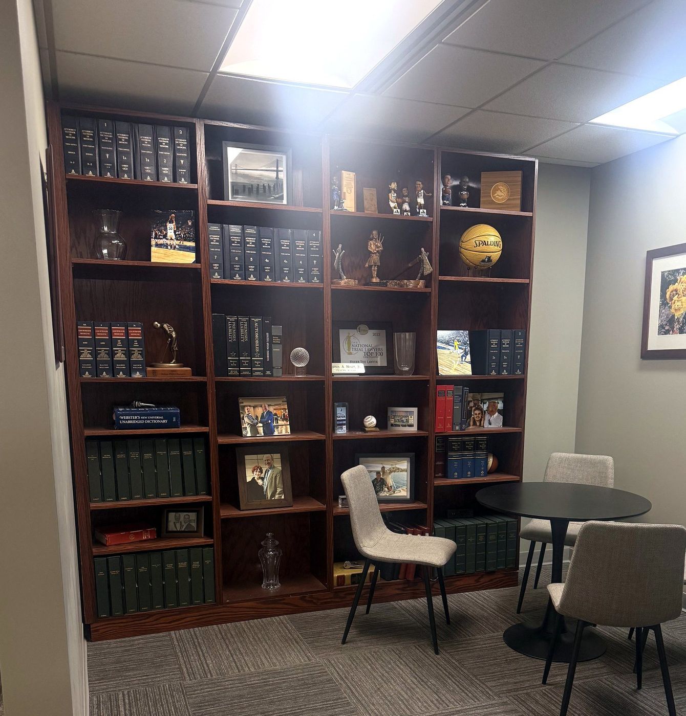 Heuer Fischer law library with the National Trial Lawyers Top 100 award